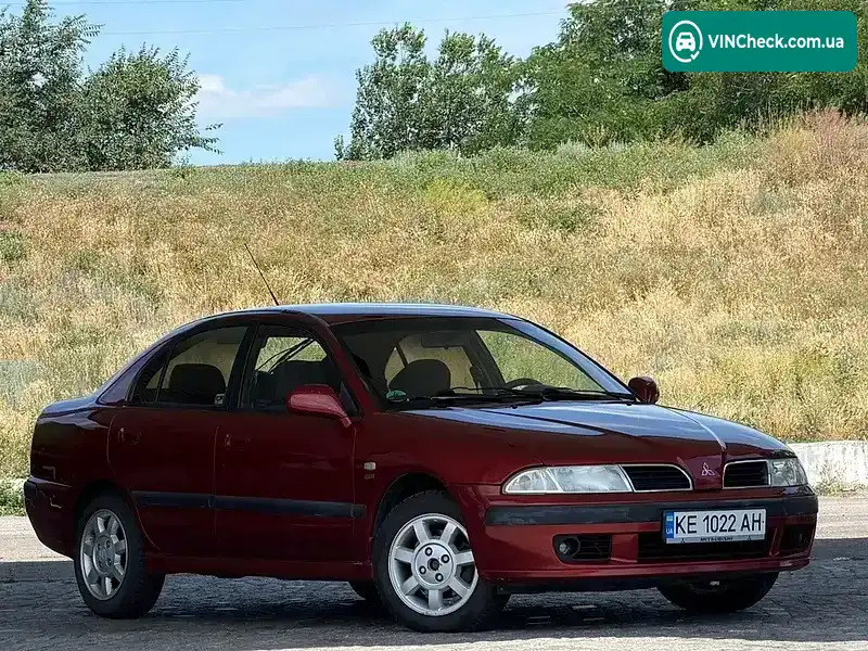 Mitsubishi Carisma 1999, фото з оголошення 2 з 12, VIN XMCLRDA2AYF030502