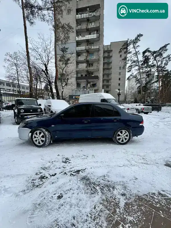 Mitsubishi Lancer 2004, фото з оголошення 2 з 15, VIN JMBSNCS3A5U003367
