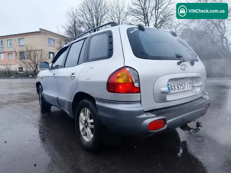 Hyundai Santa FE 2001, фото з оголошення 2 з 13, VIN KMHSC81DP1U072923