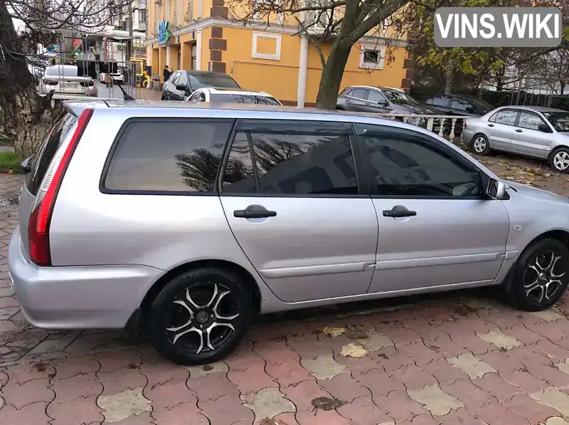 Mitsubishi Lancer 2004, фото з оголошення 2 з 7, VIN JMBLNCS3W5U000809