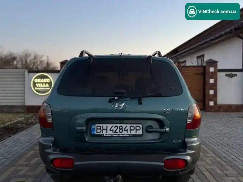 Hyundai Santa FE 2002, фото з оголошення 2 з 11, VIN KMHSC81VP1U095926