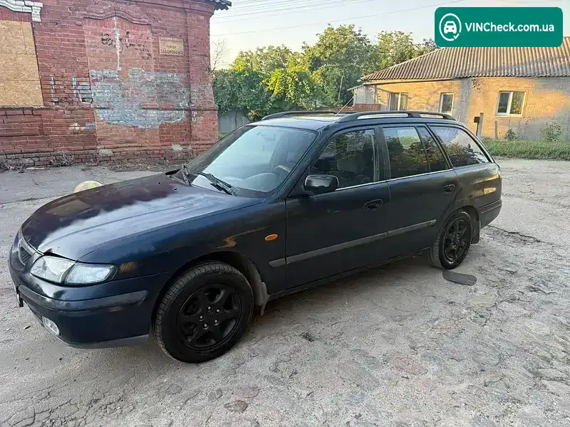 Mazda 626 1998, фото з оголошення 2 з 19, VIN JMZGW19S201124243
