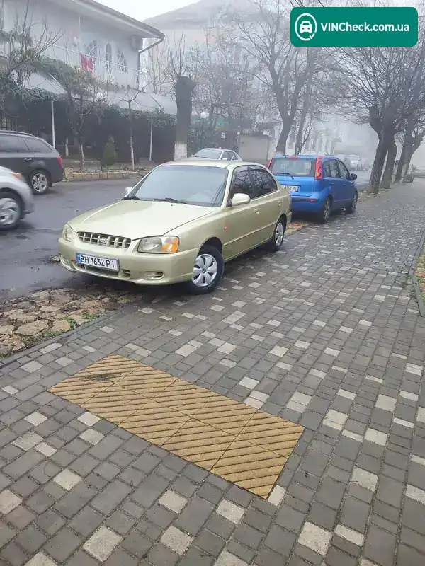 Hyundai Accent 2000, фото з оголошення 2 з 11, VIN KMHCG41FPYU120674