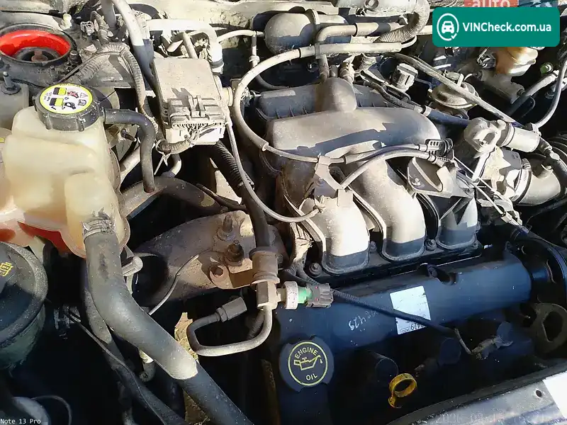Ford Escape 2002, фото з оголошення 2 з 20, VIN WF0CU93173KA23908