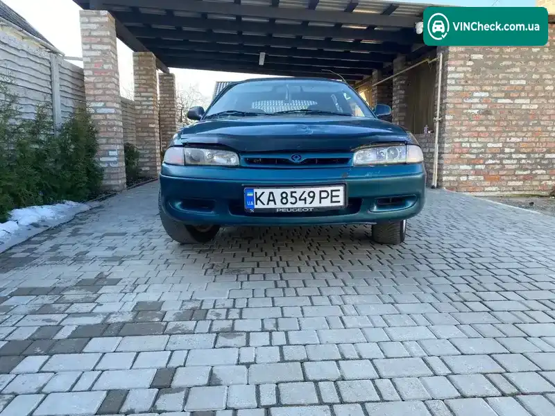 Mazda 626 1994, фото з оголошення 2 з 15, VIN JMZGE14J201239015