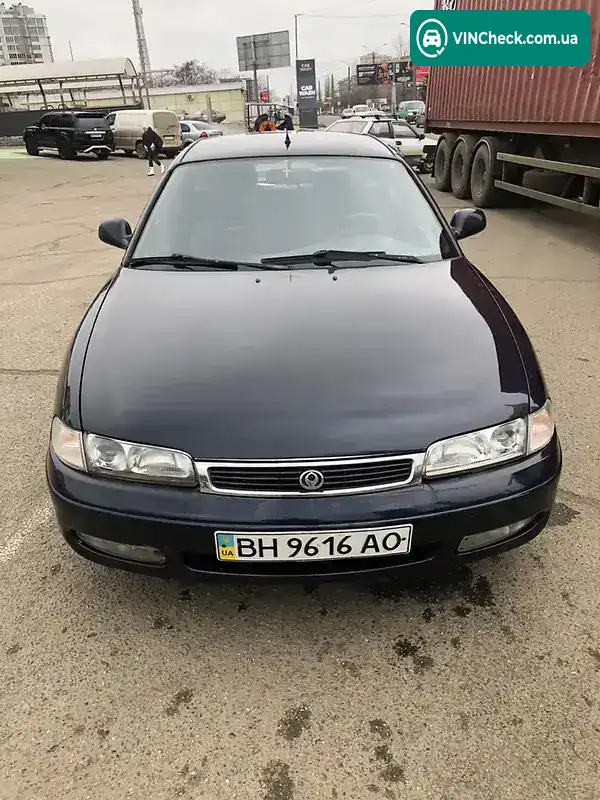 Mazda 626 1996, фото з оголошення 2 з 7, VIN JMZGE14J501472949