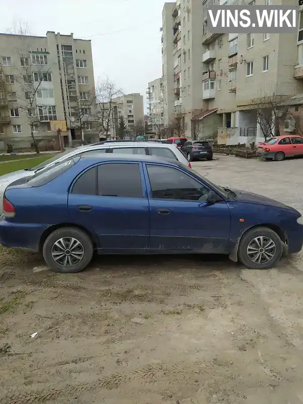Hyundai Accent 1997, фото з оголошення 2 з 4, VIN KMHVA31LPWU262840