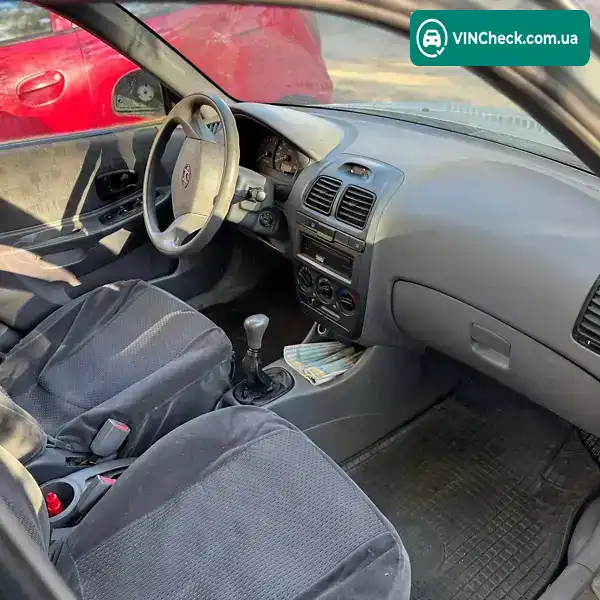 Hyundai Accent 2004, фото з оголошення 2 з 9, VIN KMHCG41FP4U521158