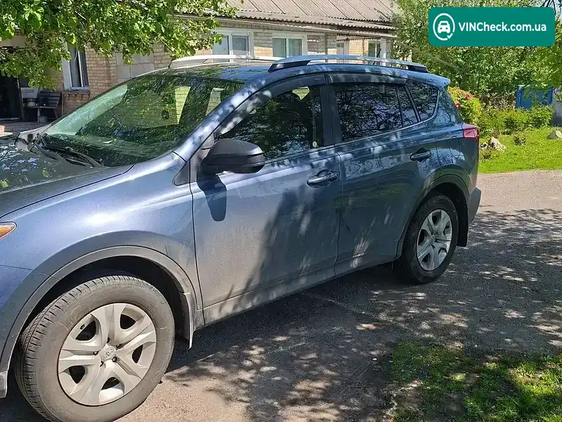 Toyota RAV4 2014, фото з оголошення 2 з 10, VIN JTMBFREV6ED090111