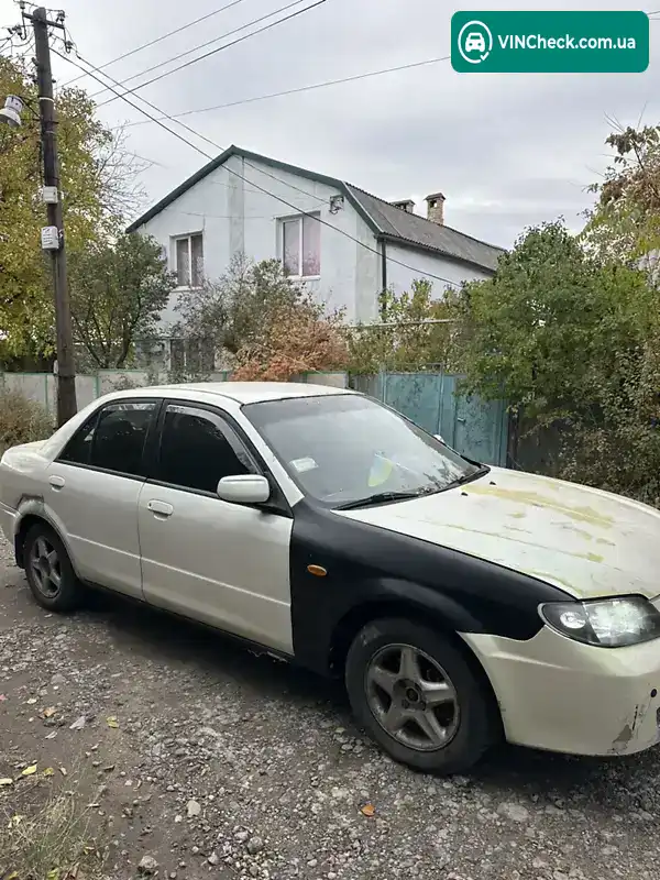 Mazda 323 2003, фото з оголошення 2 з 14, VIN JMZBJ12M531519549