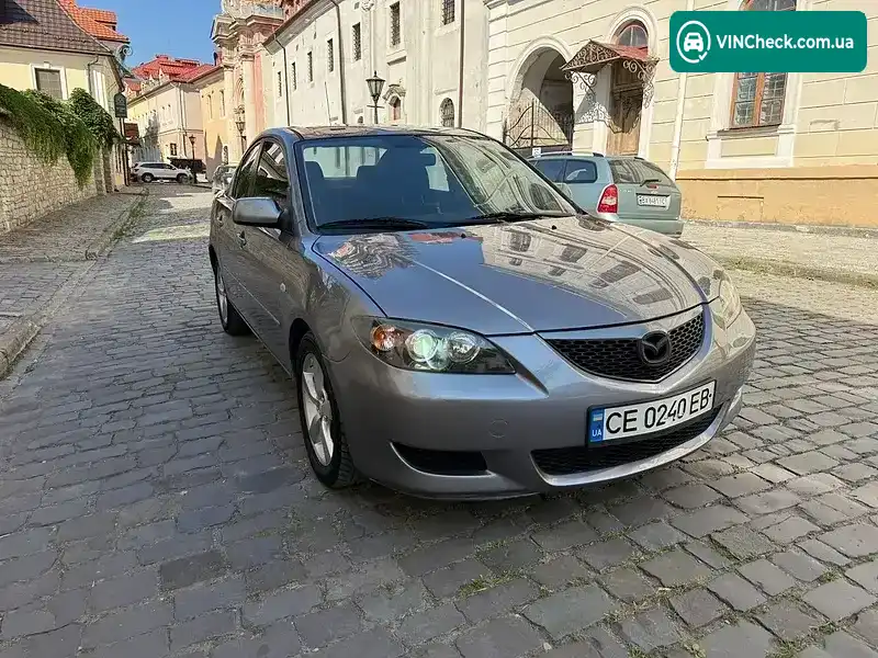 Mazda 3 2004, фото з оголошення 2 з 20, VIN JM1BK32F051220701