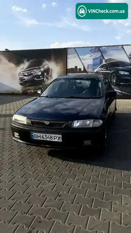 Mazda 323 1997, фото з оголошення 1 з 21, VIN JMZBA125200576508