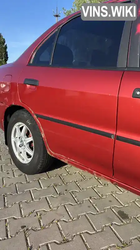 Mitsubishi Lancer 1996, фото з оголошення 2 з 8, VIN JMBSNCK1ATU003278