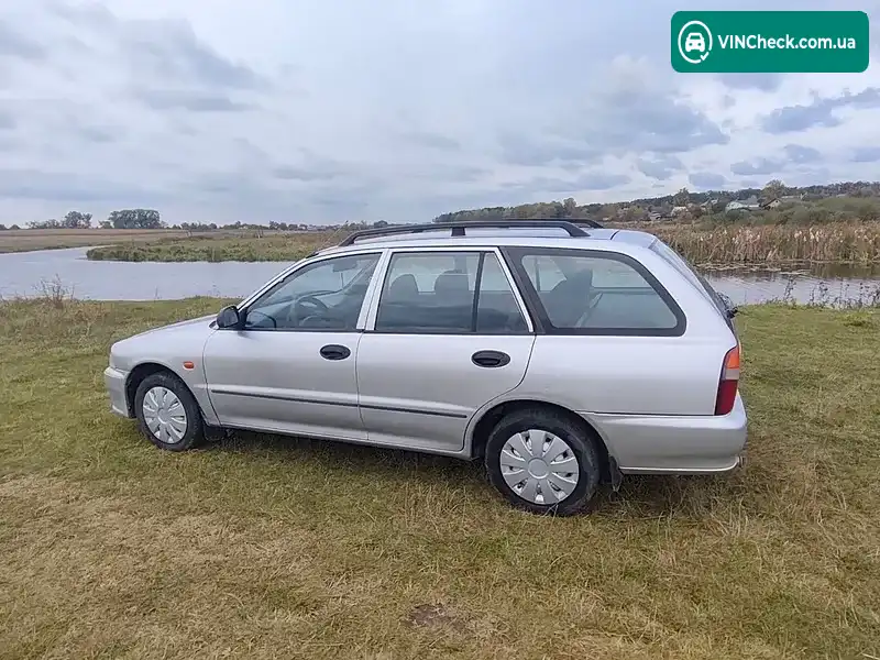 Mitsubishi Lancer 1998, фото з оголошення 2 з 9, VIN JMBLNCB4WWU503924