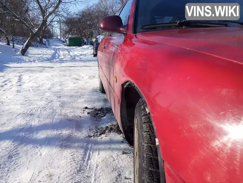 Mazda 626 1994, фото з оголошення 2 з 10, VIN JMZGE14A201237275