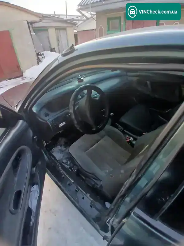 Mazda 626 1996, фото з оголошення 1 з 6, VIN JMZGE12B201475414