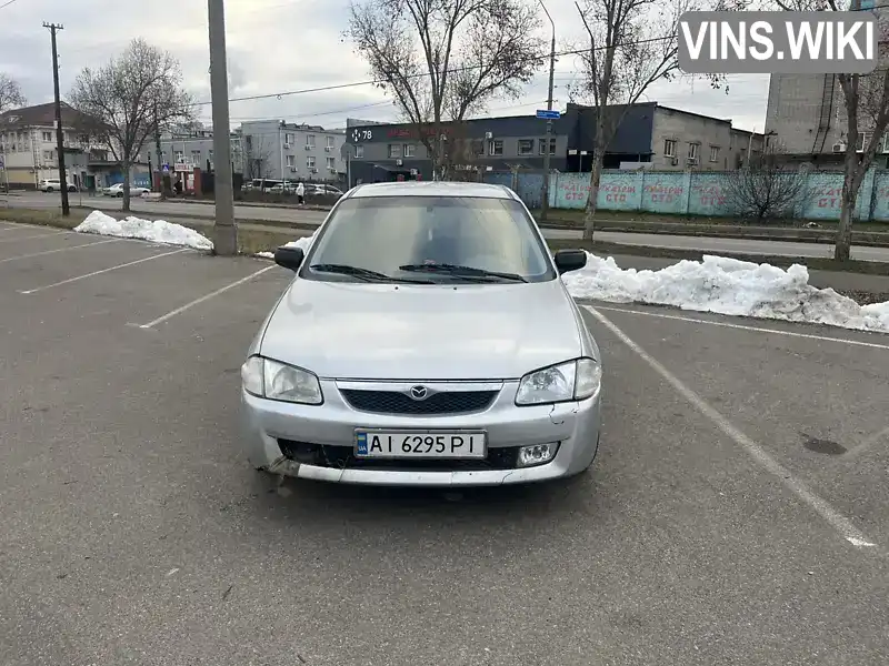 Mazda 323 1999, фото з оголошення 2 з 8, VIN JMZBJ14L201201368