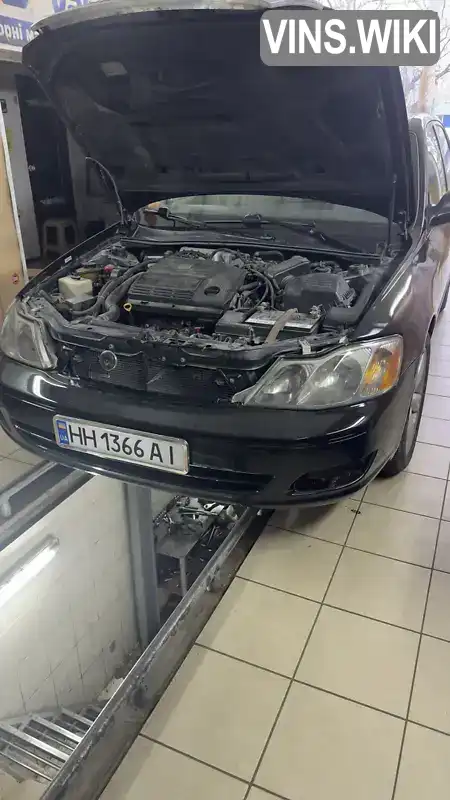 Toyota Avalon 1999, фото з оголошення 2 з 13, VIN 4T1BF28B2YU015768
