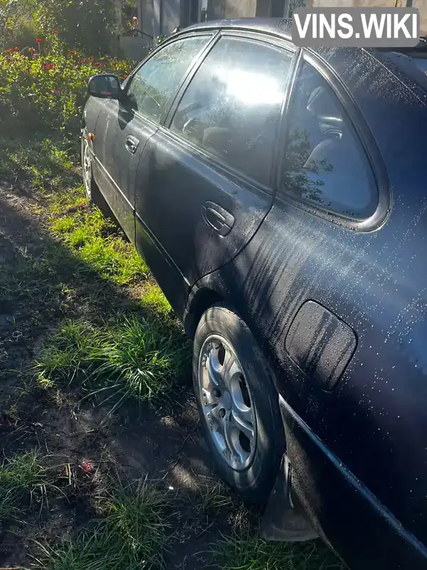 Mazda 626 1994, фото з оголошення 2 з 9, VIN JMZGE14B201400427