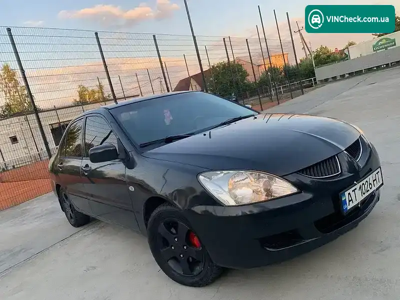 Mitsubishi Lancer 2004, фото з оголошення 2 з 20, VIN JMBSNCS3A4U010313
