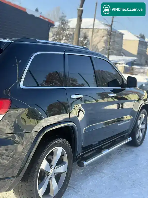 Jeep Grand Cherokee 2014, фото з оголошення 2 з 12, VIN 1C4RJFCMXEC331261