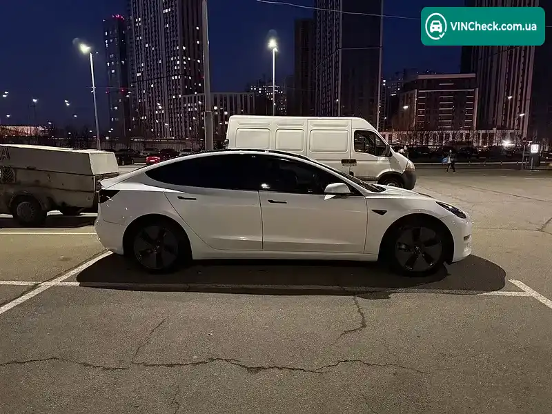 Tesla Model 3 2023, фото з оголошення 2 з 8, VIN 5YJ3E1EAXPF557239