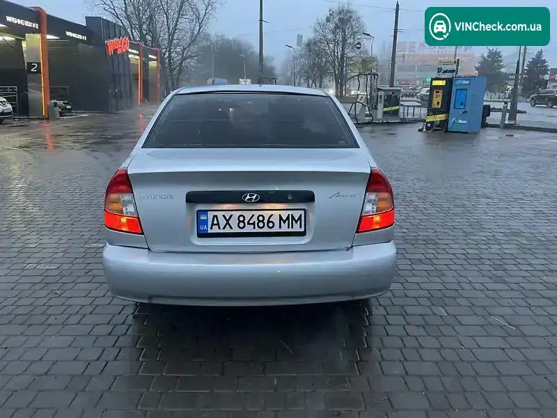 Hyundai Accent 2002, фото з оголошення 2 з 12, VIN KMHCG41GP2U394166