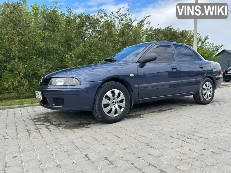 Mitsubishi Carisma 2002, фото з оголошення 2 з 21, VIN XMCSNDA1A2F019334