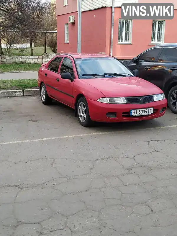 Mitsubishi Carisma 1998, фото з оголошення 1 з 20, VIN XMCLNDA1AWF056942