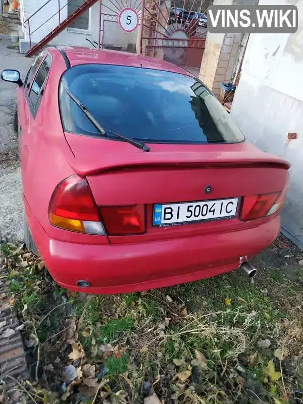 Mitsubishi Carisma 1998, фото з оголошення 2 з 20, VIN XMCLNDA1AWF056942