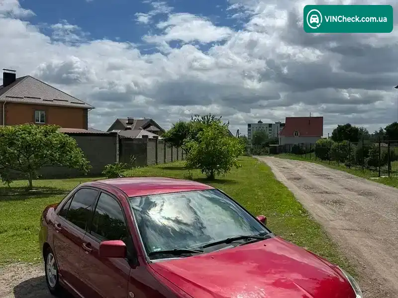 Mitsubishi Lancer 2003, фото з оголошення 2 з 20, VIN JMBSNCS3A4U003095