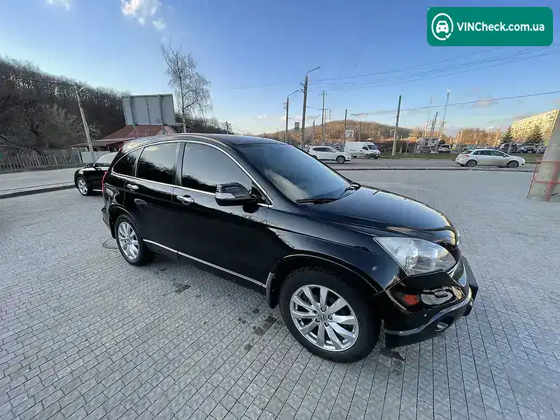 Honda CR-V 2009, фото з оголошення 2 з 8, VIN SHSRE78709U005449