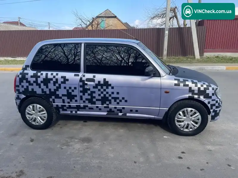 Daihatsu Cuore 2003, фото з оголошення 2 з 17, VIN JDAL701S001056173