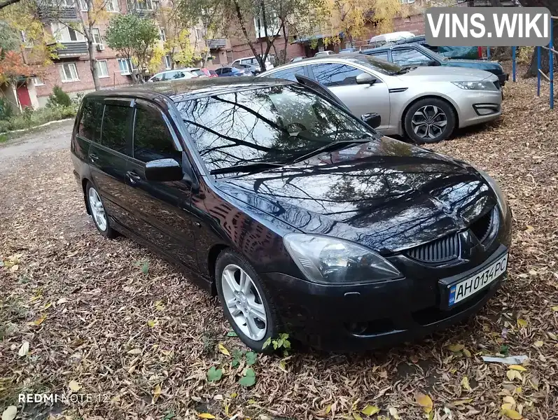 Mitsubishi Lancer 2004, фото з оголошення 1 з 8, VIN JMBLNCS9W4U004454