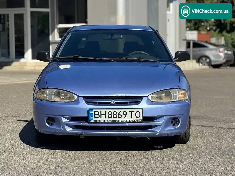 Mitsubishi Colt 1998, фото з оголошення 2 з 9, VIN JMBMNCJ1AWU002860