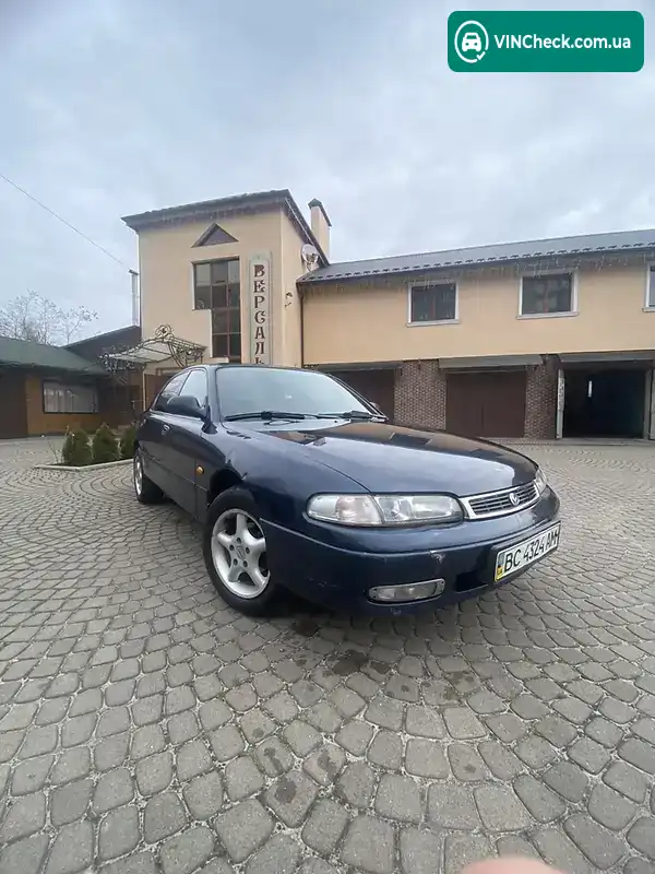 Mazda 626 1996, фото з оголошення 1 з 7, VIN JMZGE12A201461391