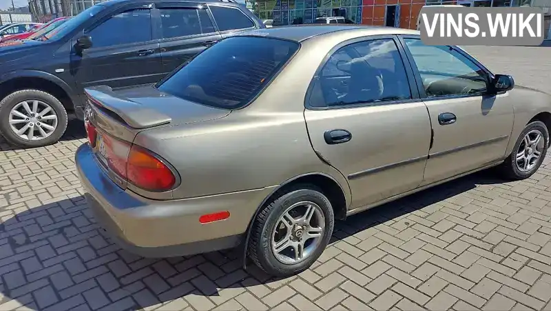 Mazda Protege 1997, фото з оголошення 2 з 10, VIN JM1BC1419V0125112