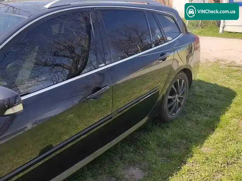 Renault Laguna 2012, фото з оголошення 2 з 14, VIN VF1KTD20646736069