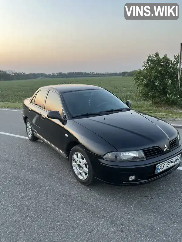 Mitsubishi Carisma 2003, фото з оголошення 2 з 14, VIN XMCSNDA1A3F037352