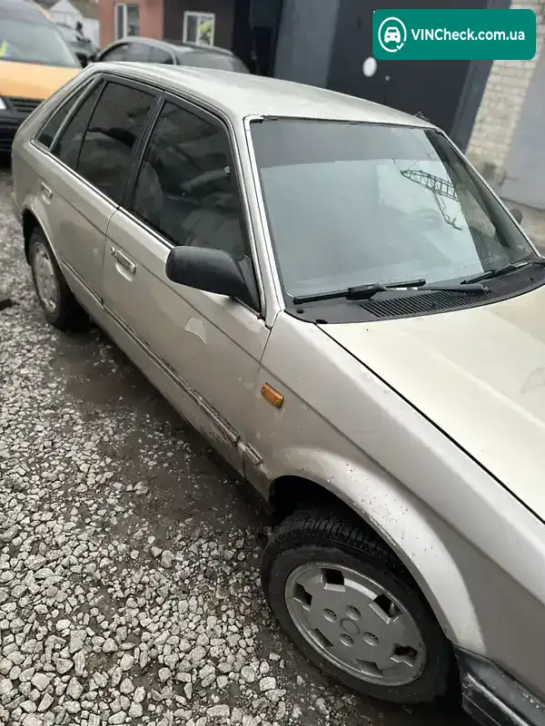 Mazda 323 1987, фото з оголошення 2 з 6, VIN JMZBF14H200548998
