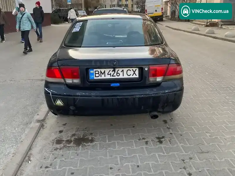 Mazda 626 1995, фото з оголошення 2 з 8, VIN JMZGE12B201434342