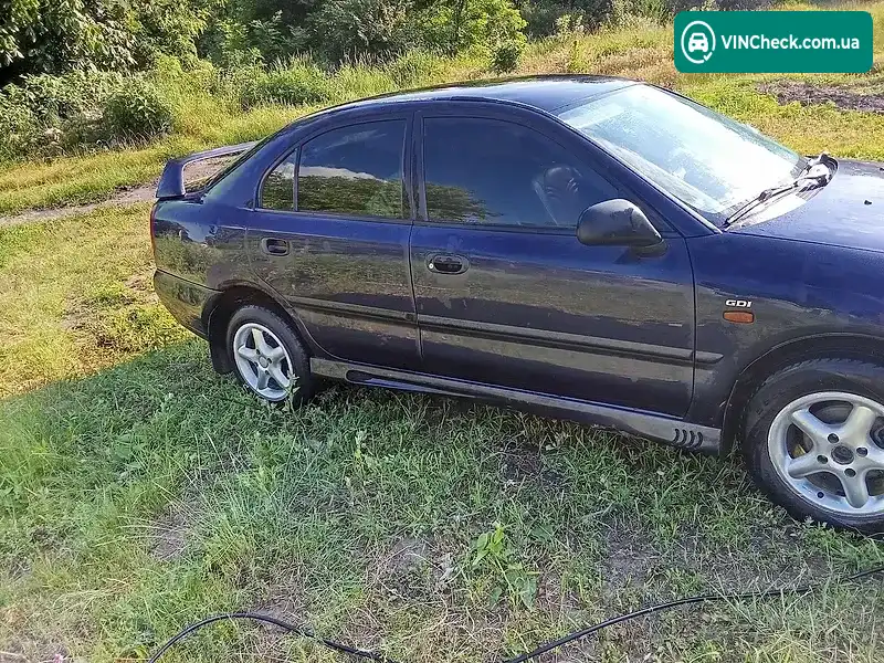 Mitsubishi Carisma 1998, фото з оголошення 2 з 14, VIN XMCLNDA2AWF104649