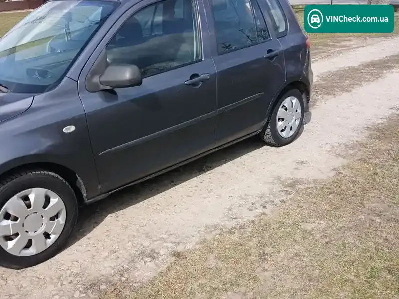 Mazda 2 2003, фото з оголошення 1 з 9, VIN JMZNCAWPJN3U72314