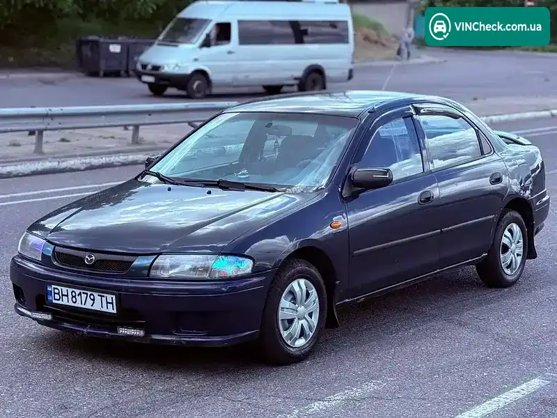 Mazda 323 1998, фото з оголошення 1 з 12, VIN JMZBA125200644866