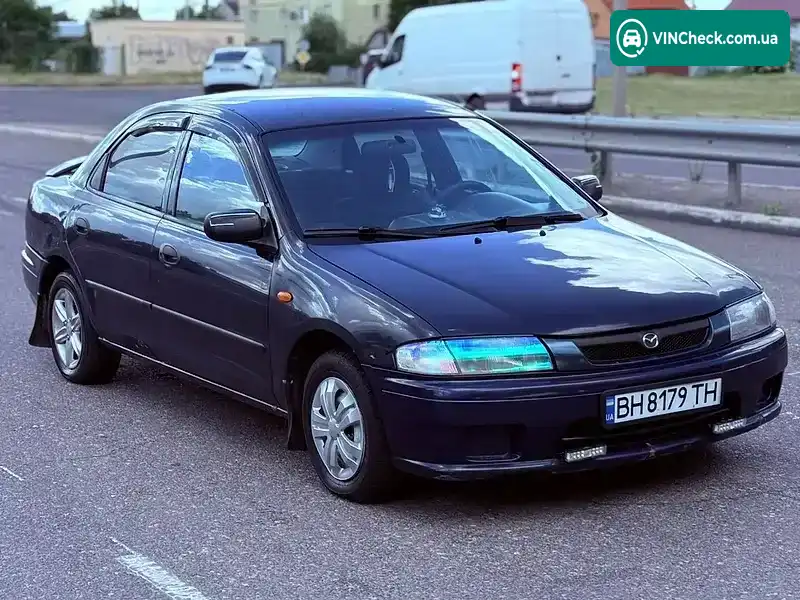 Mazda 323 1998, фото з оголошення 2 з 12, VIN JMZBA125200644866