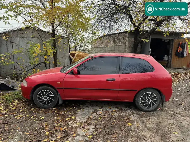 Mitsubishi Colt 1996, фото з оголошення 2 з 13, VIN JMBMNCJ1ATU006795