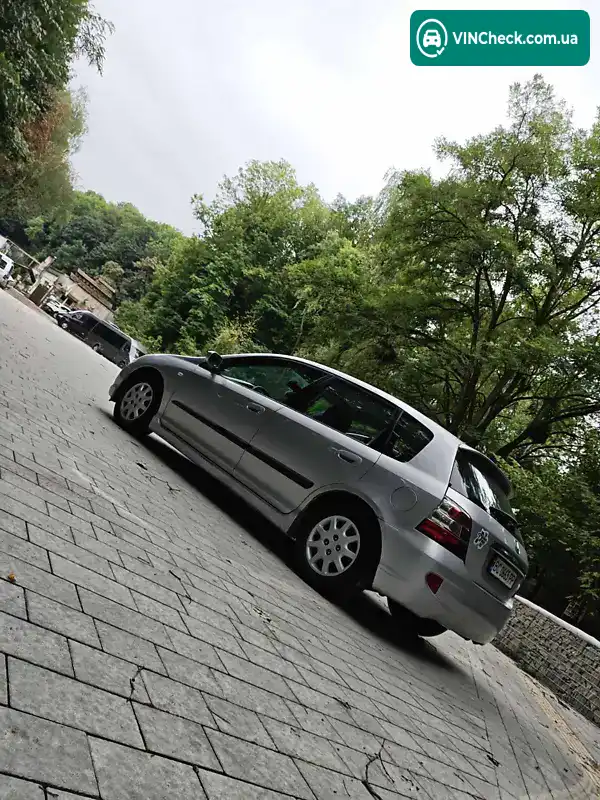 Honda Civic 2004, фото з оголошення 2 з 17, VIN SHHEU77404U203260