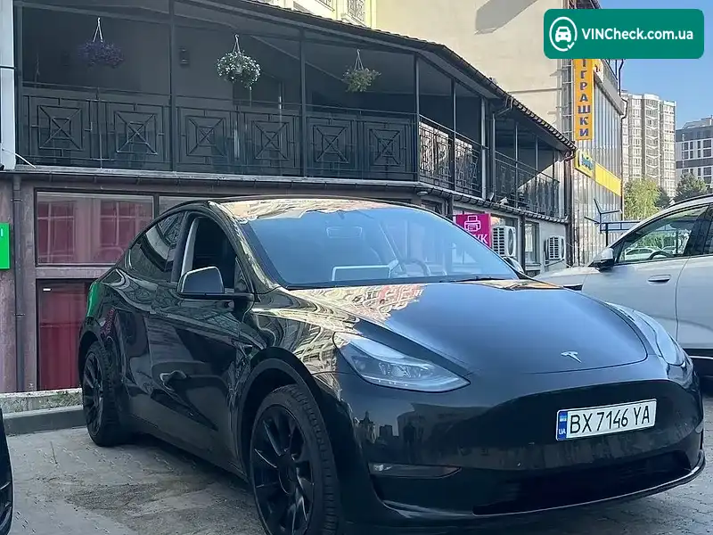 Tesla Model Y 2023, фото з оголошення 2 з 20, VIN 7SAYGAEE7PF847007