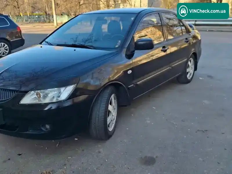Mitsubishi Lancer 2004, фото з оголошення 2 з 7, VIN JMBSNCS3A5U004108