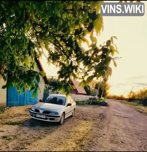 Mitsubishi Carisma 2001, фото з оголошення 1 з 16, VIN XMCLNDA2A2F009021
